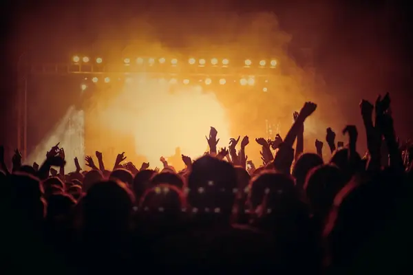 Stage lights illuminating a concert